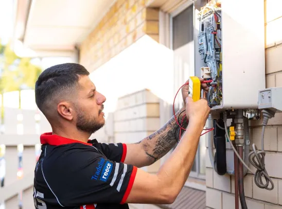 plumber doing maintenance of heater