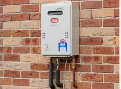 DUX heater installed on a wall