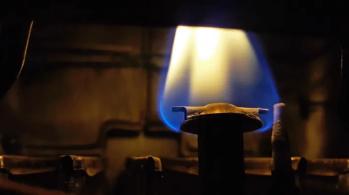 Flame burning inside a heater.