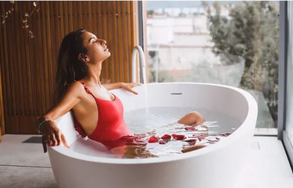 Woman relaxing in bath
